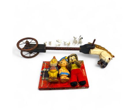A collection of vintage toys including a hobby horse, ceramic Walt Disney Dalmatians, 3 soft toys and a robot game.