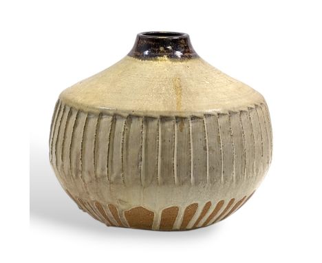 Janet Leach (American, 1918 - 1997) for Leach Pottery, a large stoneware vase, of squat form, the tenmoku glazed rim above a 