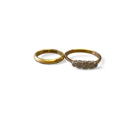 Two Rings Including An 18ct Yellow Gold Wedding Band Size F Approximately And An Unmarked Five Stone Diamond Ring Tested As A