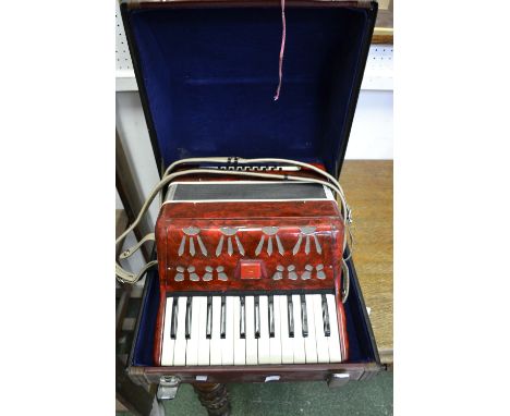 A Baile accordion, cased