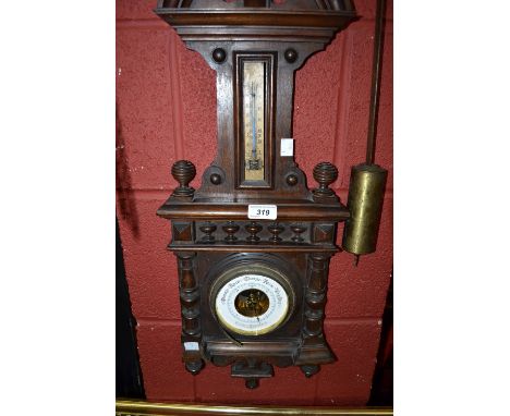 A mahogany cased aneroid barometer, with thermometer