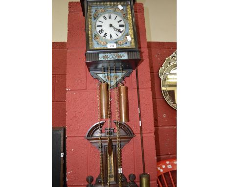 An American wall clock, floral panels, pendulum and weights