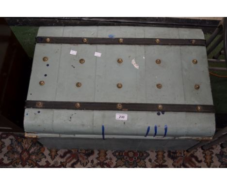 A Vintage domed top metal trunk