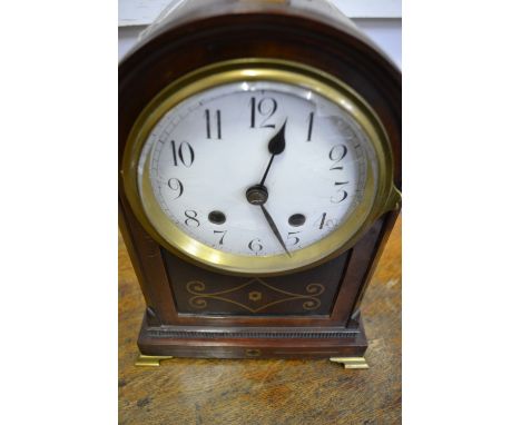 A mahogany and brass inlaid bracket clock