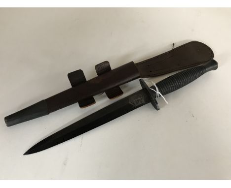 A Fairbairn-Sykes Third Pattern fighting knife, signed The F-S Fighting Knife, Wilkinson Sword Co. Ltd. London, in leather sh