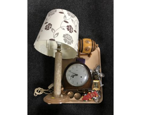 A pottery wash jug and basin, a tray of Smiths mantel clock, Bakelite table lamp and shade, napkin rings, cutlery 