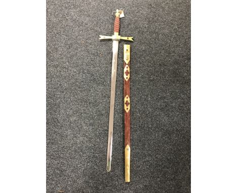 A Medieval type sword with jeweled scabbard