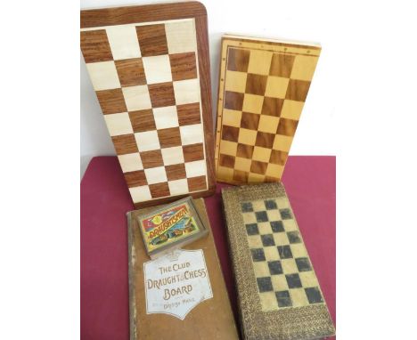 Three chess sets in folding cases, The Club Draughts  and Chessboard and a set of Globe Series draughtsman in box (5) 