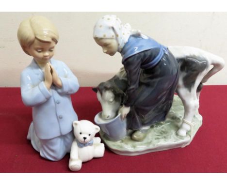 Royal Copenhagen model of a milkmaid with a calf (H16cm) and a Leonardo Collection of a child playing with a bear (2) 
