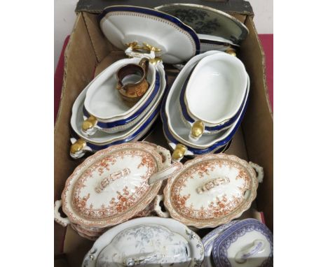 Two Royal Worcester Vitreous china rectangular vegetable dishes, two sauce dishes and four stands, two Victorian K &amp; Co O