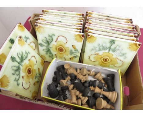 Turned wooden chess set, and a collection of twenty tiles decorated with yellow Art Nouveau foliage and green leafage 