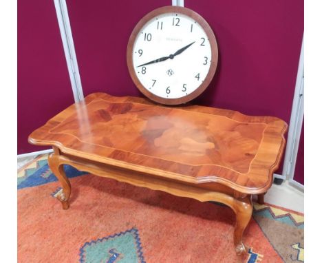 Walnut coffee table with a shaped rectangular top and single end drawer on cabriole legs. (L105cm x W57cm x H45cm), quartz ra