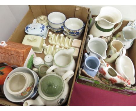 Collection of kitchen ceramics including teapot and milk jug decorated with sheep, others decorated with cows and chickens et