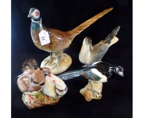 A large Royal Dux model of a pheasant, no. 315, pink lozenge and printed green mark to base, 24cm, together with a Beswick mo