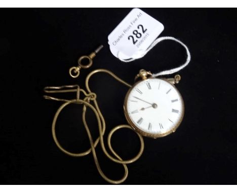 An 18ct gold key wind fob watch, ornately decorated in traditional design, the plain white face with Roman numerals, together