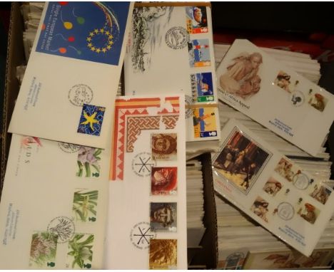 In excess of 1,800 Queen Elizabeth II first day covers, various years from 1970-2000, contained within four boxes.