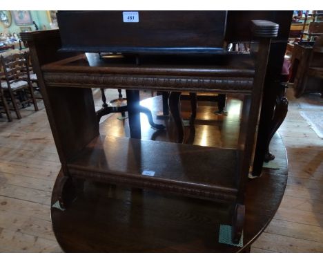 A circa 1930's oak piano stool.