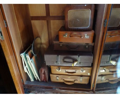 A quantity of vintage suitcases, together with a circa 1960's radio speaker, a child's table and chair fold-a-way picnic set 