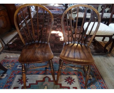 A pair of Windsor stick back chairs.