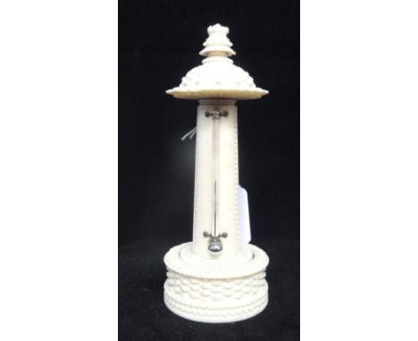 An early 20th century ivory tower thermometer, 15cm tall.