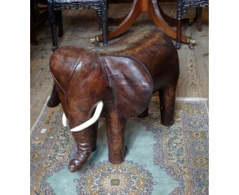 A 20th century leather stool, probably by Omersa for Liberty, in the form of an elephant, 54 x 75cm.