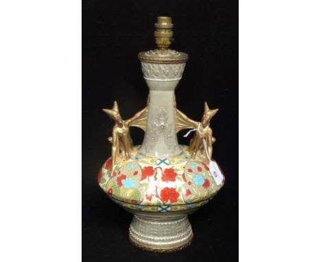 A late 19th century Old Hall vase by Christopher Dresser, later converted to a table lamp, the twin handles formed of gilt im