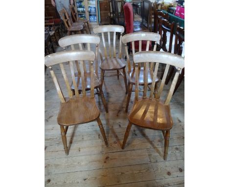 A set of five beech stick back chairs, united by H stretcher on turned supports.