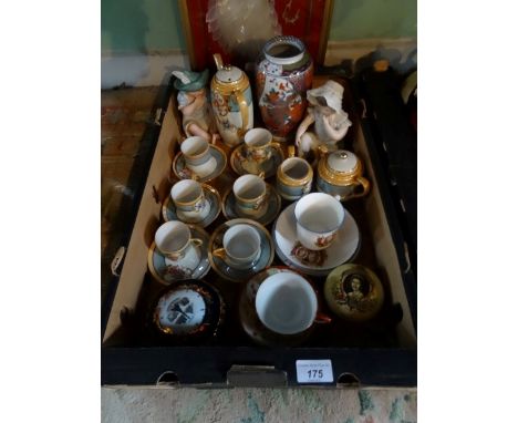 A framed and glazed peacock formed of shell, together with a box containing decorative china,
2 ceramic piano dolls, commemor