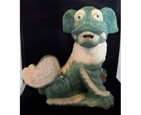 A large ceramic Dog of Fo in polychrome enamel, 41cm.