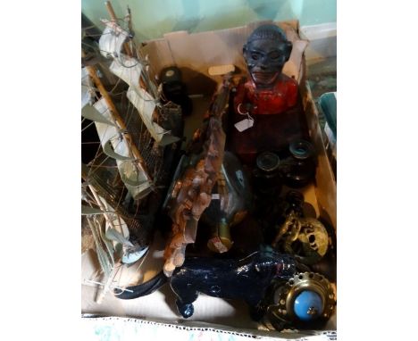 A box of interesting collectors items, to include: mechanical money box, a scratch built model of a galleon, a metal nutcrack