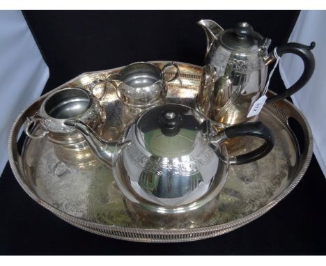 A Sheffield plate galleried tray with tea service, comprising: teapot, water jug, cream jug and twin handled sugar bowl.