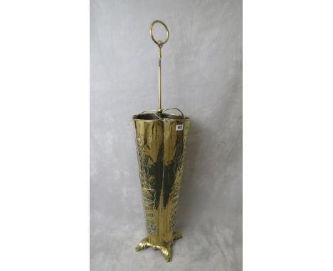 A 19th century brass stick stand in the form of an umbrella with embossed decoration