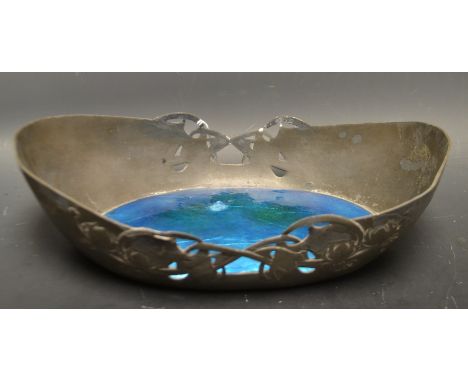 Archibald Knox (1864-1933) - a Tudric pewter dish, for Liberty & Co., of oval outline with turquoise enamel panel to the inte