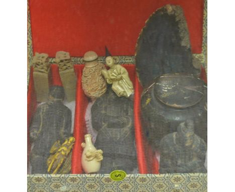 A netsuke of a dragon, another netsuke of a bottle with oriental figures, another;  a paper mache pot and cover decorated wit