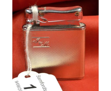 A silver Colibzi lighter 