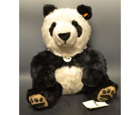A Steiff panda bear, Manschli with tags and lables 