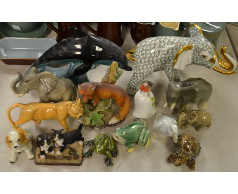 Ceramics - a large Poole Pottery dolphin;  a Beswick lioness, faults;  a ceramic frog etc 