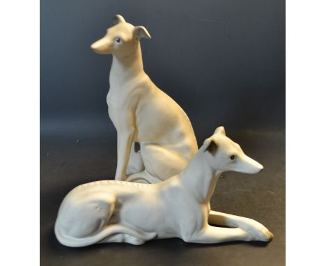 A pair of ceramic greyhound models