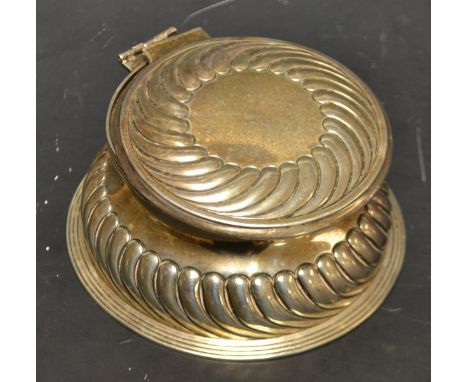 A Victorian silver table top inkwell, spiral gadooned cover and sides, triple ring foot, cover detached, marks rubbed, with c