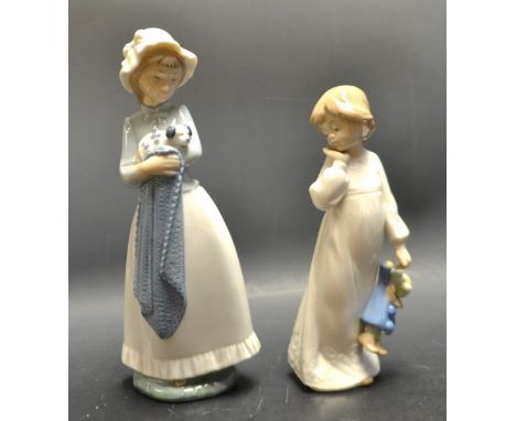 A Nao figure, Girl With Puppy; another, Girl With Bear (2)