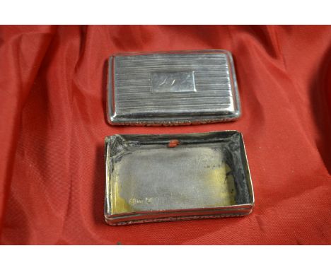 A George III silver rounded rectangular snuff box, hinged cover centred by a rectangular cartouche, horizontal banding throug