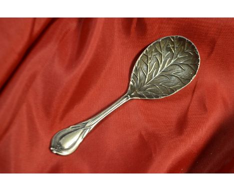 An early 20th century silver leaf form caddy spoon, James Dixons and son, Sheffield 1901  