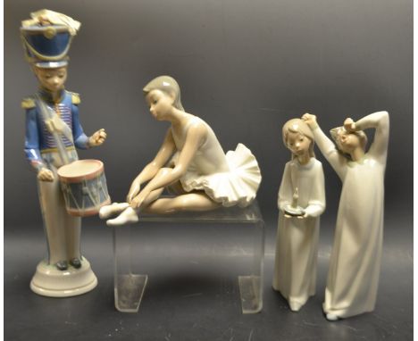 A Lladro figure of a little Drummer boy; a Nao ballerina; others (4)