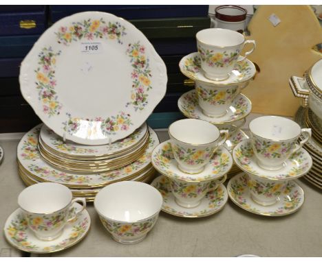 A Colclough Floral print tea set, comprising eight cups and saucers, six tea plates, six cake plates, six dinner plates, sand
