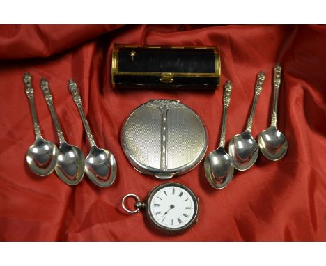 A Silver compact; a Swiss Silver fob watch; a snuff box; apostle spoons.