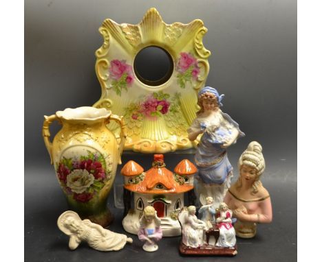 Ceramics - a Staffordshire cottage, a Staffordshire mantel clock decorated with pink roses; a German half doll; a German bisq