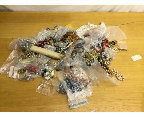 A box of vintage dress jewellery