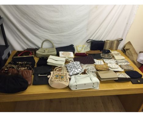 A quantity of vintage handbags