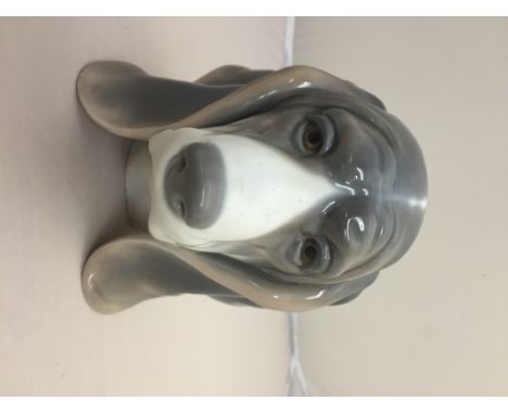 A Lladro dog bust