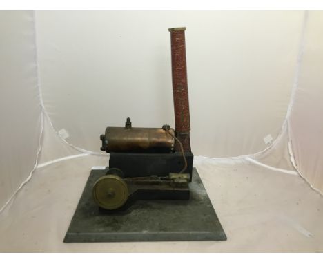 A stationary steam engine: width 12 inches & height 15 inches